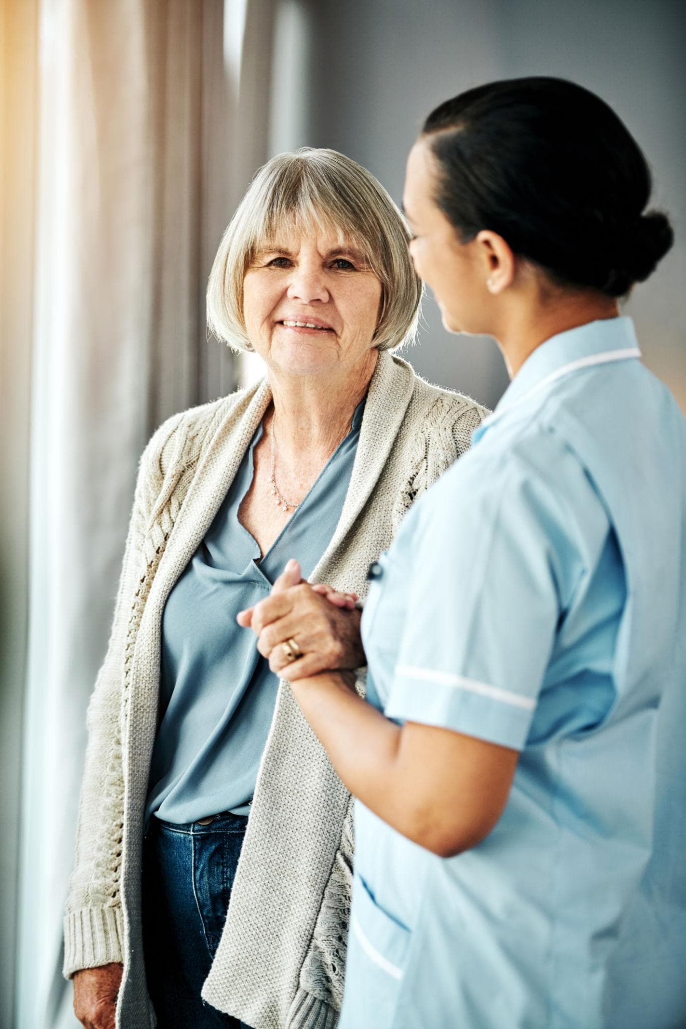 Elderly resident placing trust in their caregiver