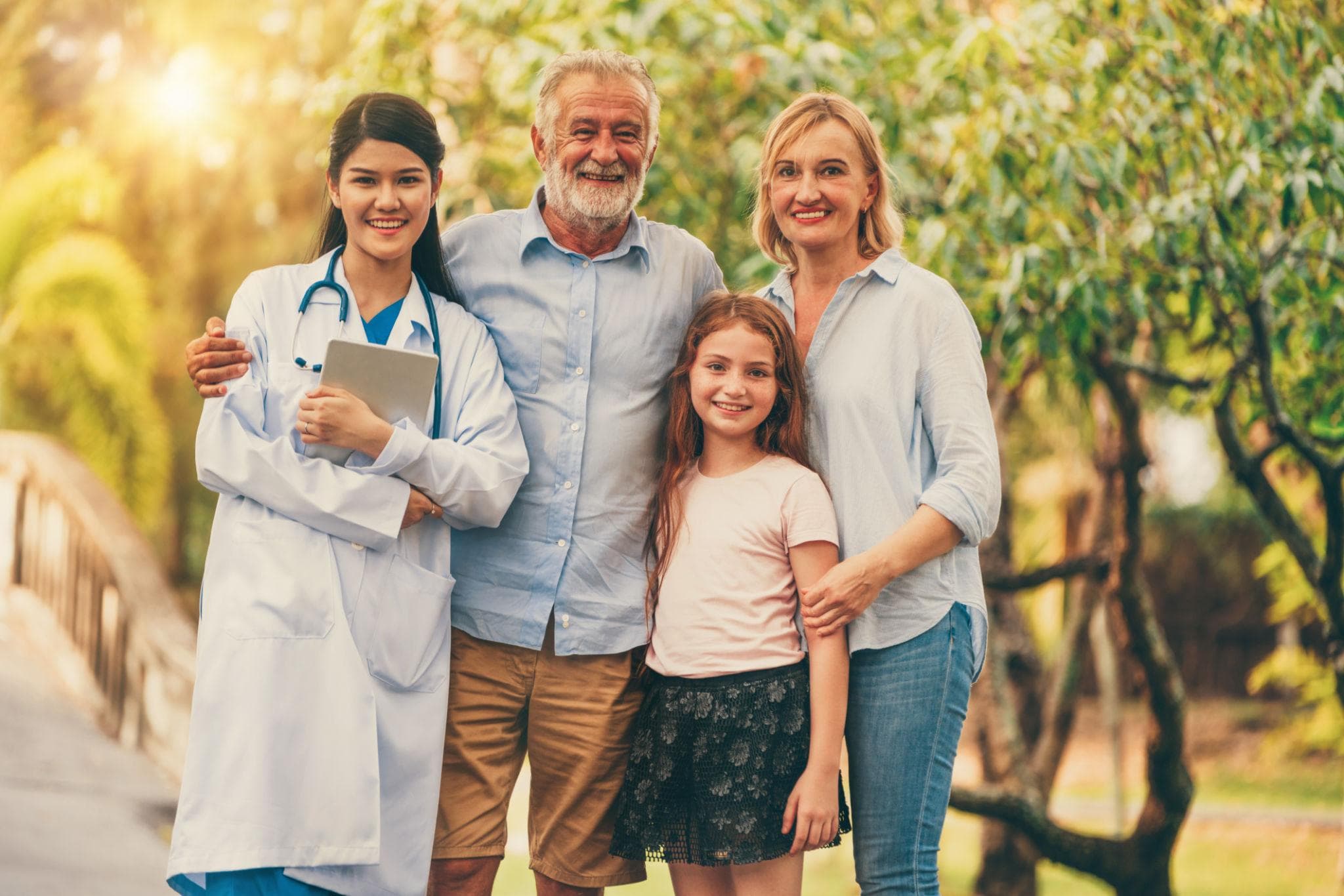 Nurse sharing a happy moment with a resident's family